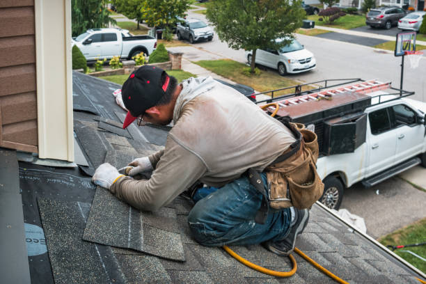 Professional Roofing technician working in Oakfield, WI
